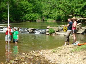 Field crew measuring White Clay Creek Dam No. 2, May 2010