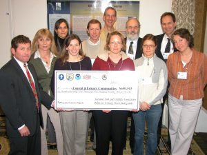 Martha Narvaez receives check from NFWF at Del. Estuary Summit in Cape May, NJ, Jan 2009
