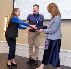 Nicole presents 2026 GIS Service award to Andrew and Tracey DeLiberty (May 14, 2026)