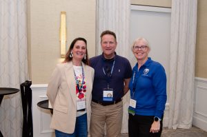 Andrew and DNREC's Lori Brown with Kyla Cupp, DEGIS 2026 Map Gallery winner (May 14, 202^