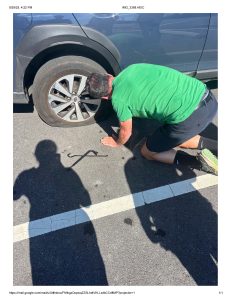 Jerry changing tire during Brandywine field sampling on the isthmus in Wilmington (Sep 2025)